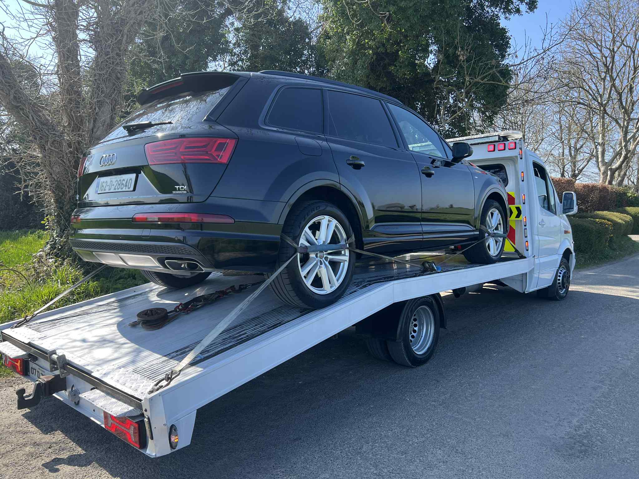 audi a7 jeep on a tow truck swords 